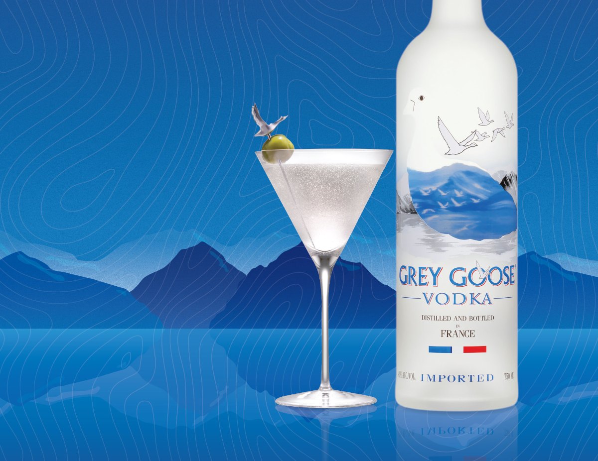 A Grey Goose Martini and the bottle against the French Alps