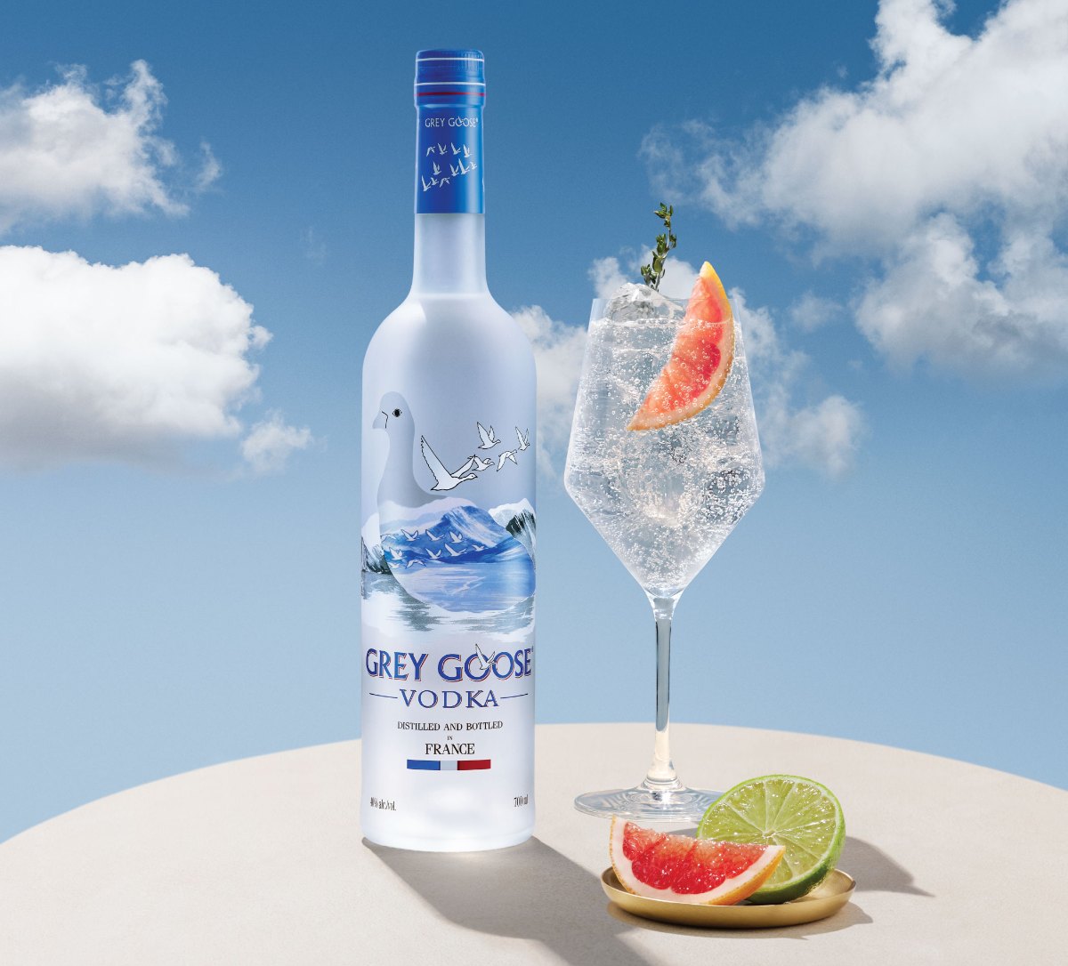 Grey Goose with a grapefruit and soda serve under open sky